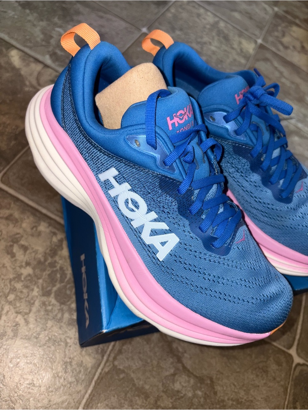 Hoka One One Women's Blue Running Shoes with Pink and Orange Accents
